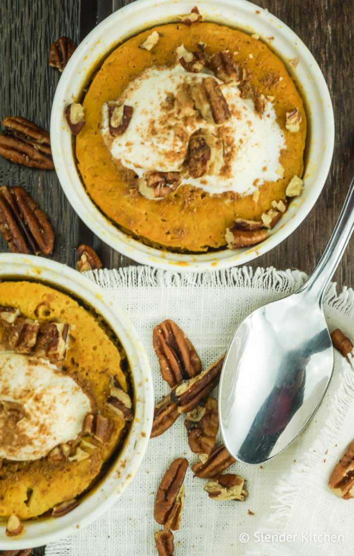 Microwave Pumpkin Custard with pecans and whipped cream.