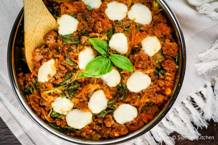 Italian Spaghetti Squash Casserole with a wooden spoon.