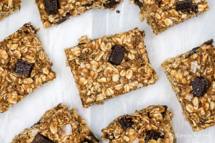No Bake Peanut Butter Banana Oatmeal Bars on parchment paper cut into slices.