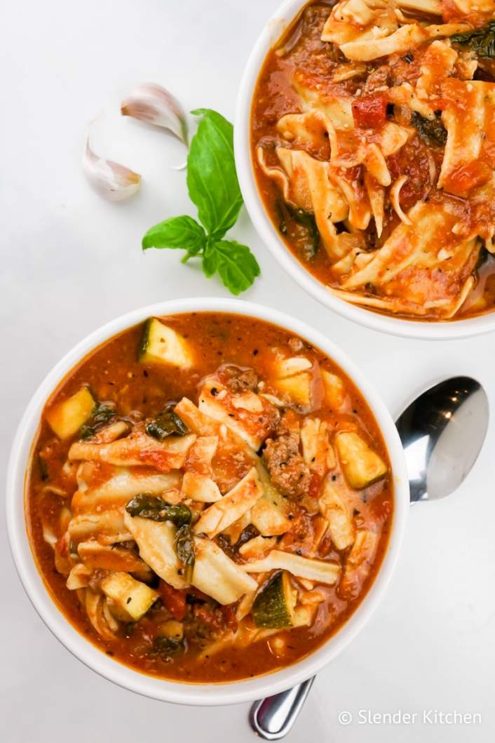 Healthy Slow Cooker Lasagna Soup with garlic, noodles, and ground beef.