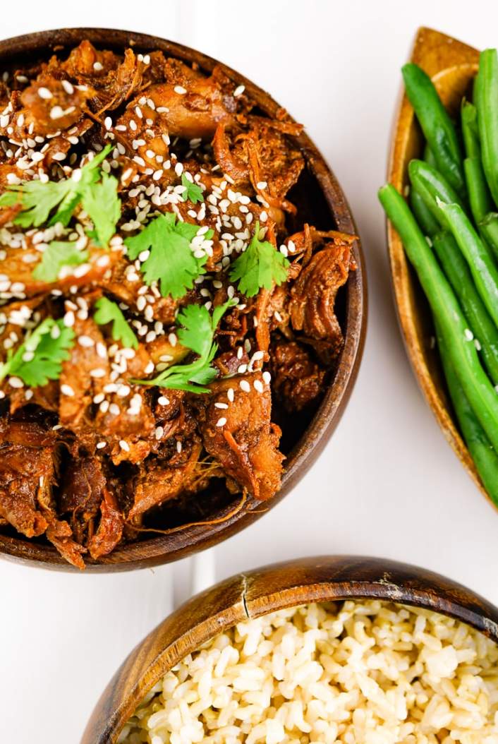 Instant Pot Honey Garlic Chicken in a wooden bowl.