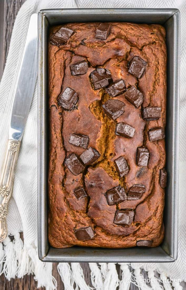 Healthy Pumpkin Chocolate Chip Bread in a pan right out of the oven.