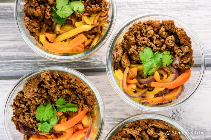 Three glass containers with taco bowls and cauliflower rice.