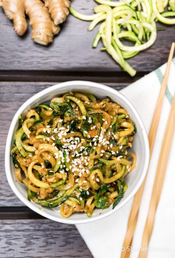 Asian Sesame Zucchini Noodles with ginger and raw zucchini.