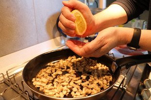 Squeezed lemon with hand