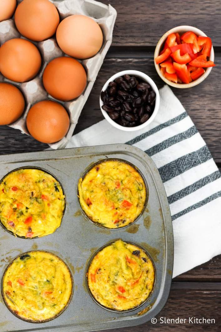 Healthy Egg Muffins with black beans, red peppers, onion, and jalapeno.