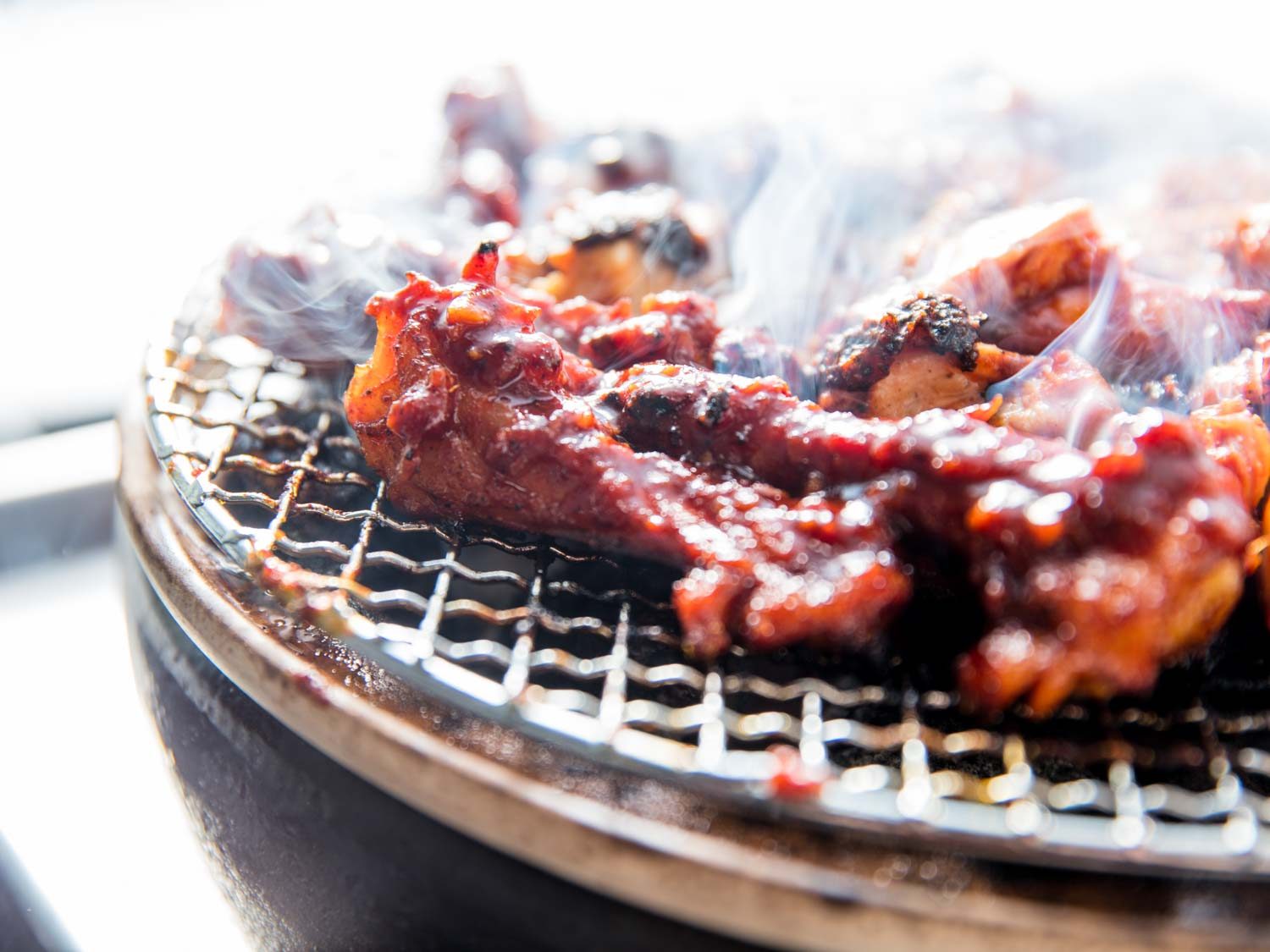 Closeup of chicken on the grill