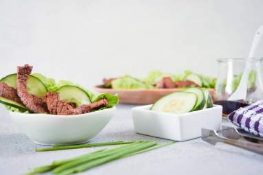 Korean beef lettuce wraps with cucumbers ,green onions, and homemade sauce.