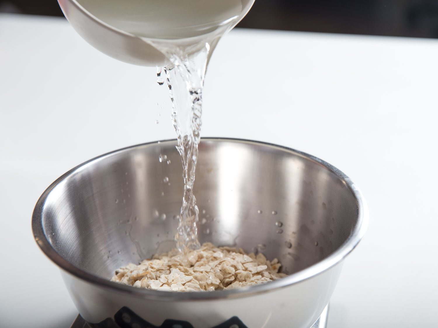 soaking matzo in water to soften it for matzo brei