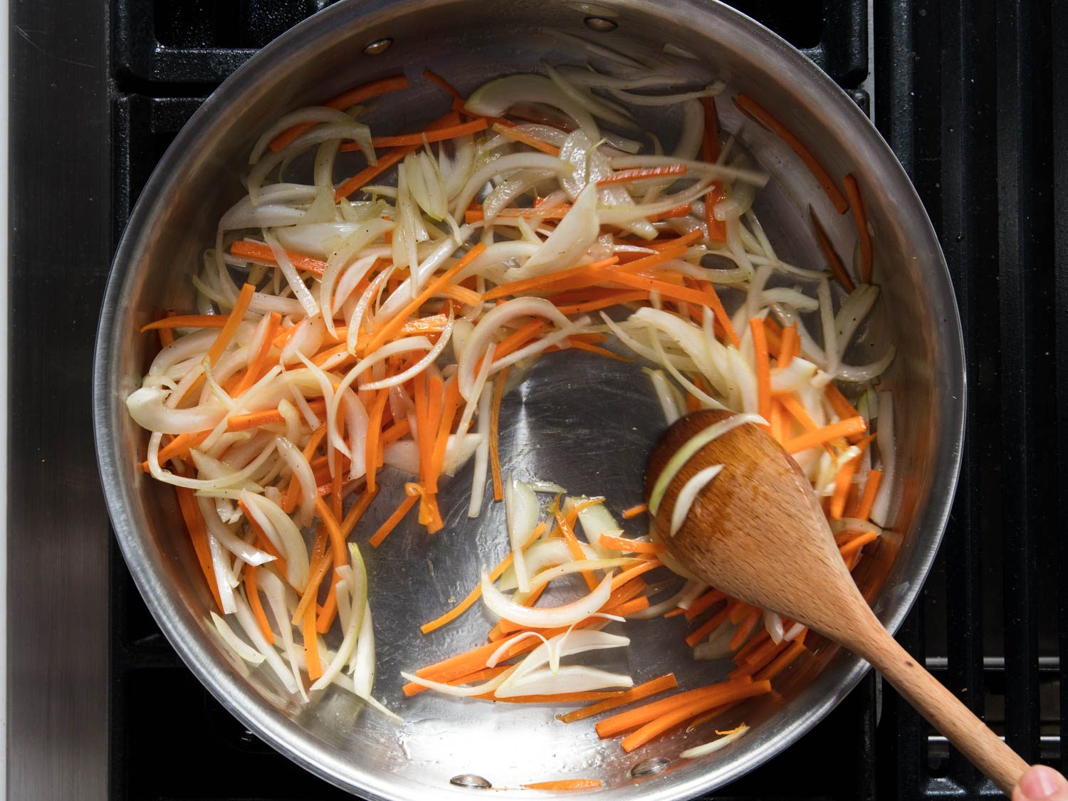 Sautéing the carrot and onion for japchae