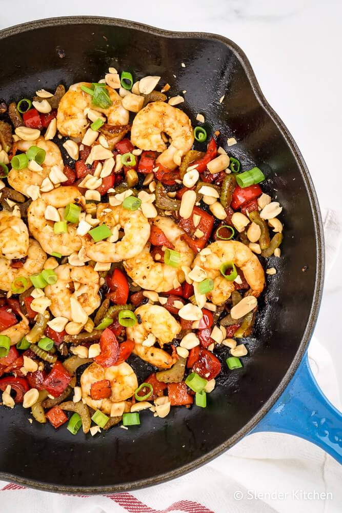 Shrimp Kung Pao with peanuts, red peppers, celery, and green onions.