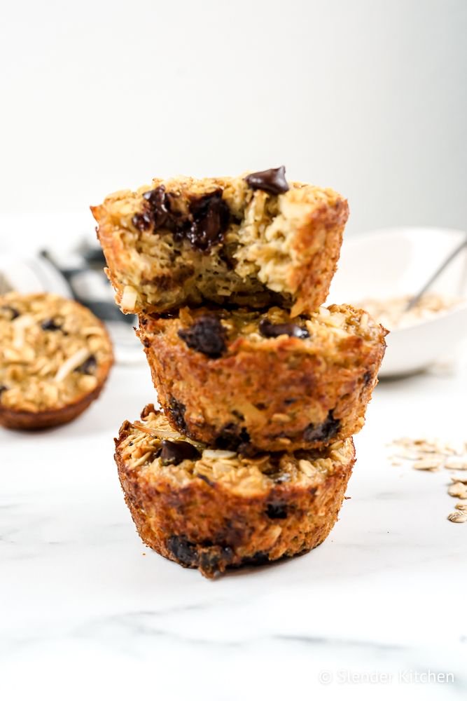 Banana Chocolate Coconut Oatmeal Muffins stacked on top of each other.