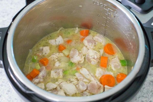 Chicken and vegetables in an instant pot.