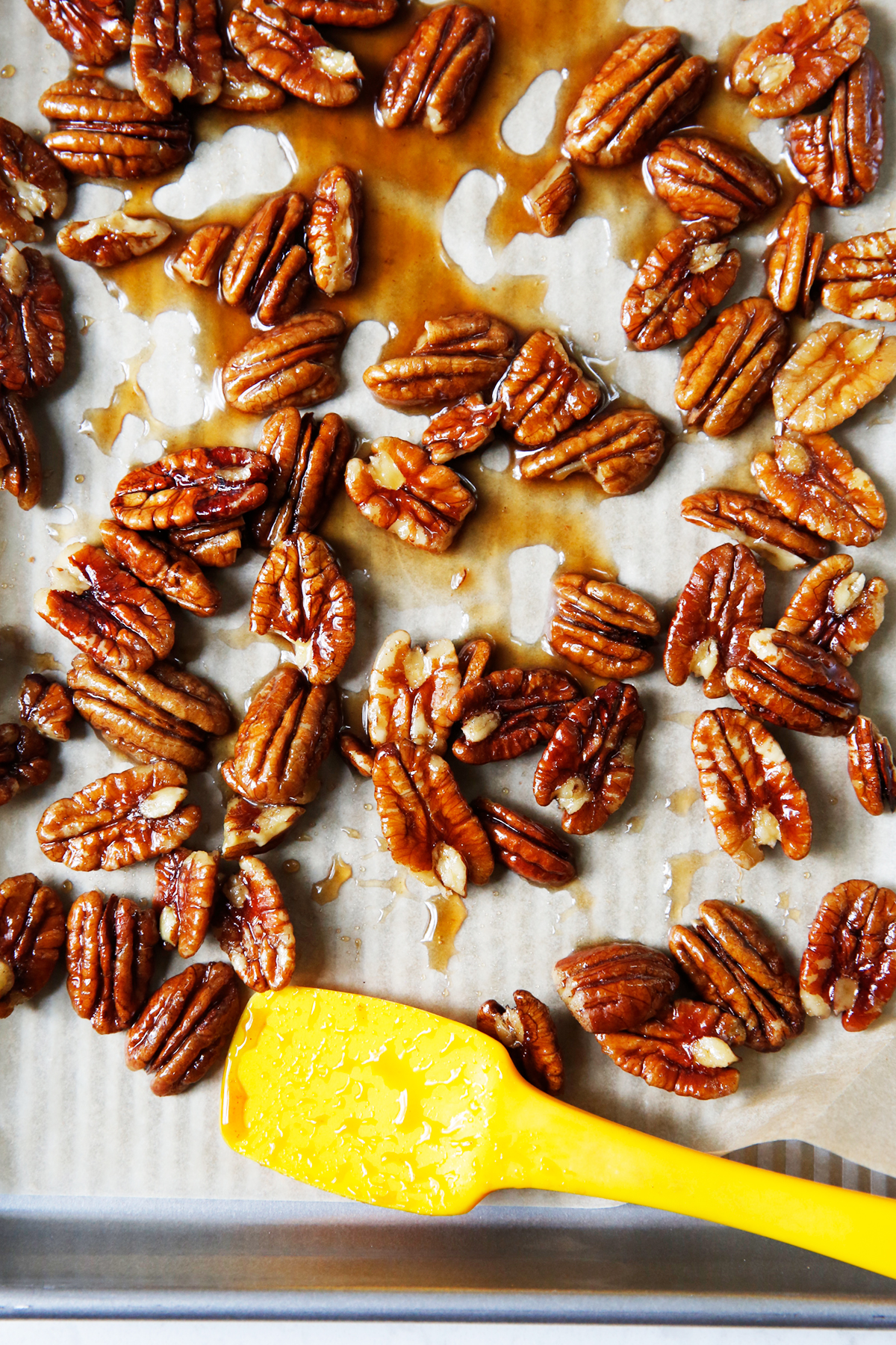 Candied pecans on a sheet pan