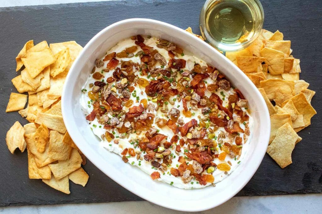 7-layer goat cheese dip served with pita chips