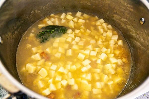 potatoes and other ingredients to make classic clam chowder