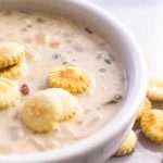 Bowl of the best clam chowder recipe! With corn and oyster crackers!