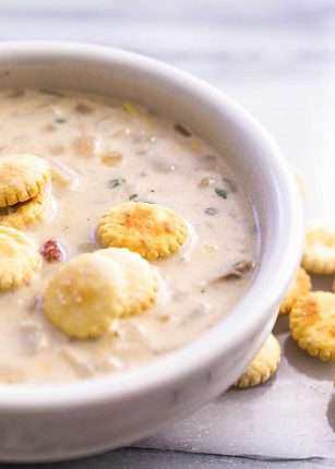 Bowl of the best clam chowder recipe! With corn and oyster crackers!