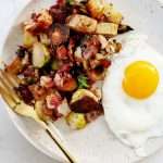 Thanksgiving leftover breakfast hash with a fried egg