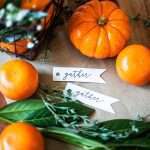 clementines and pumpkins with gather place cards