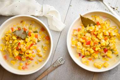 Slow Cooker Roasted Corn Chowder Slow cooker corn chowder with red peppers, carrots, celery, and poblano peppers in a creamy broth.