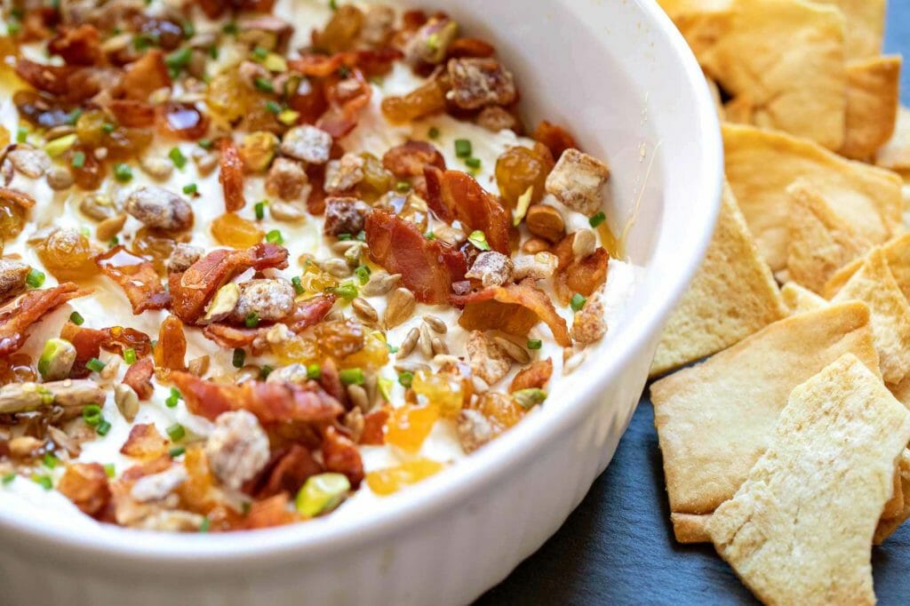 pita chips with 7-layer goat cheese bacon raisins dates dip