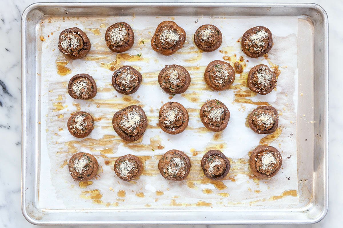 Baked mushroom caps on a baking sheet, ready to eat