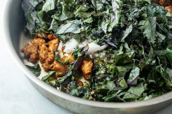 Kale in pan for Sausage and Kale Skillet Dinner