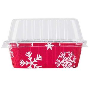 A red disposable aluminum foil mini loaf pan with snowflakes on it.